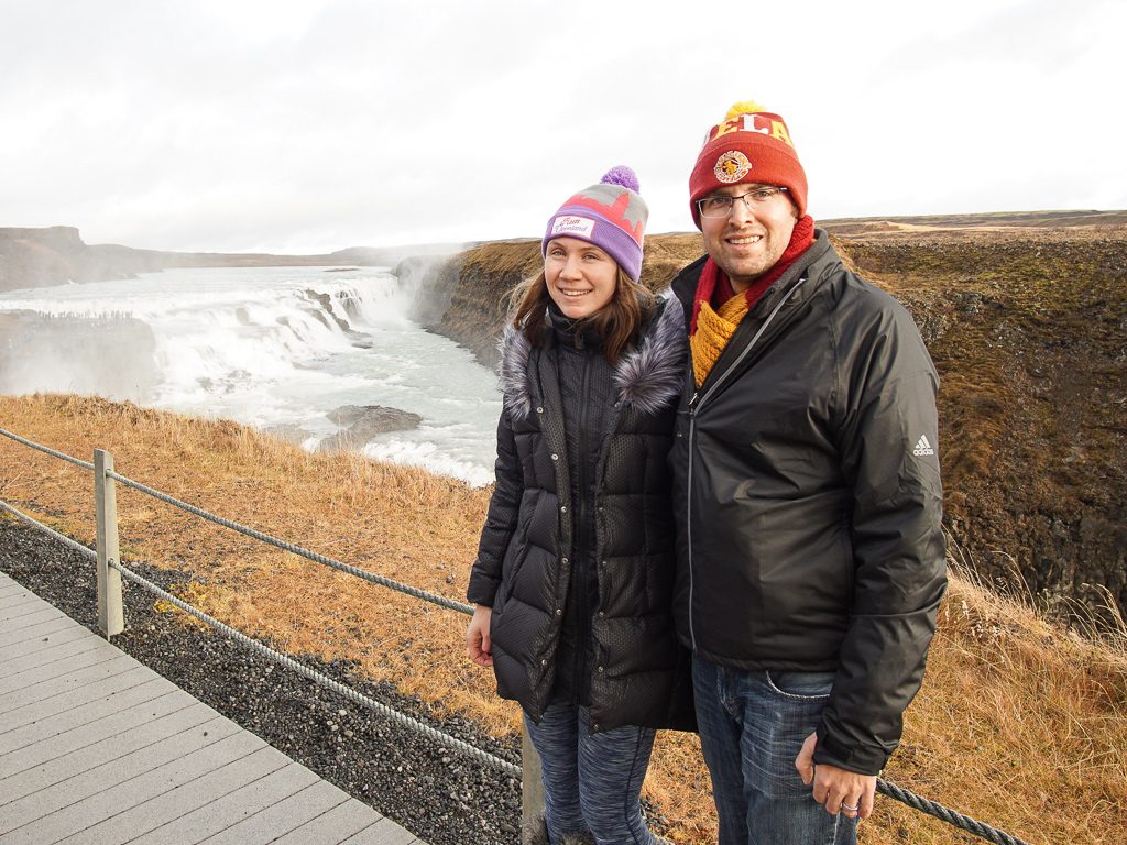 Couple in front of Gulfoss - Travel Before Kids