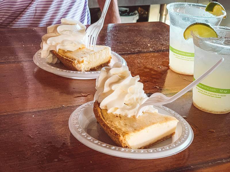 Two pale yellow pieces of key lime pie with whipped cream at Skinny Legs - things to do in St John USVI