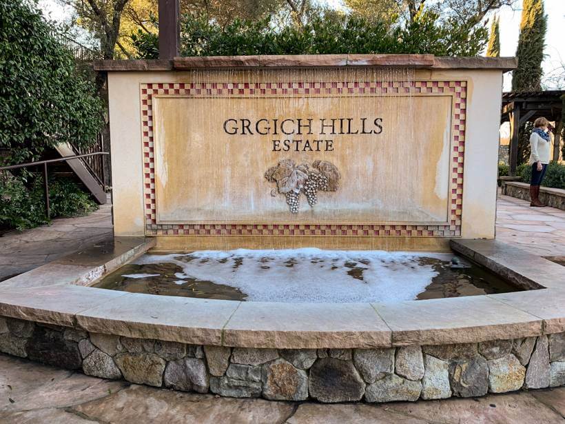sign and fountain at entrance to grgich - wineries to visit in napa