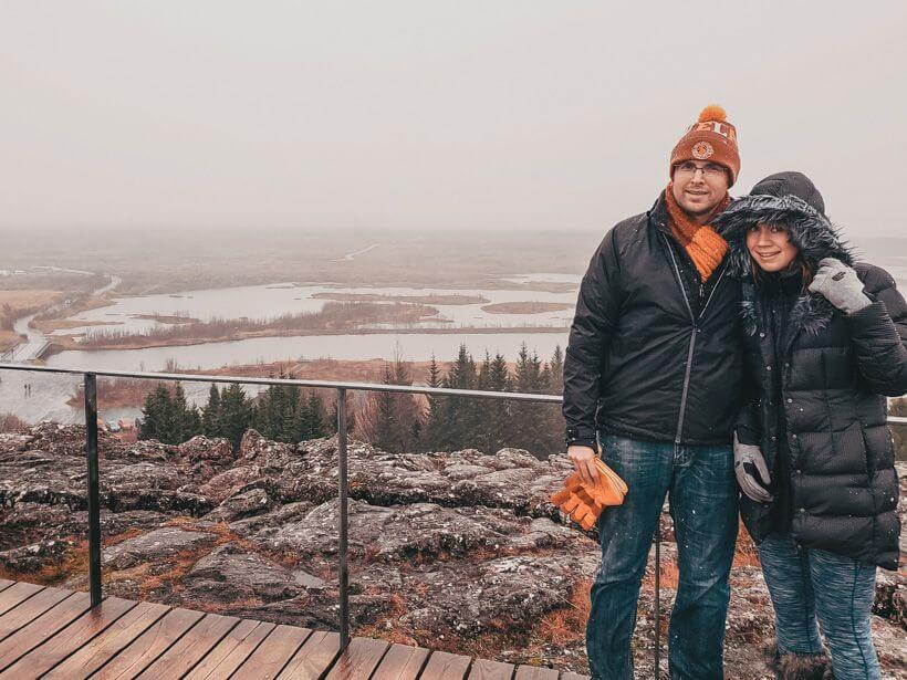 Man and woman standing at viewing point at Thingvellir National Park - 4 days in Iceland