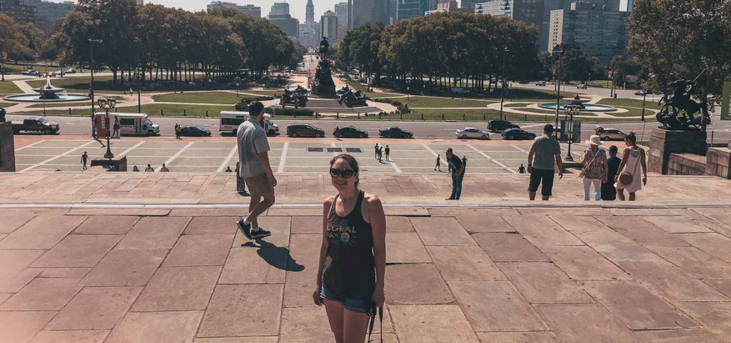 girl standing on rocky steps in philly