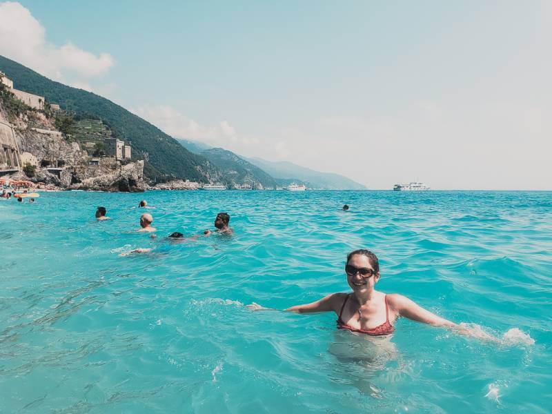brunette girl swimming in Ligurian Sea in Monterosso Al Mare during 2 days in Cinque Terre