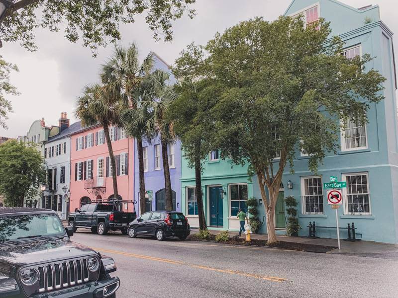 colorful rainbow row on an overcast day - romantic things to do in Charleston, SC