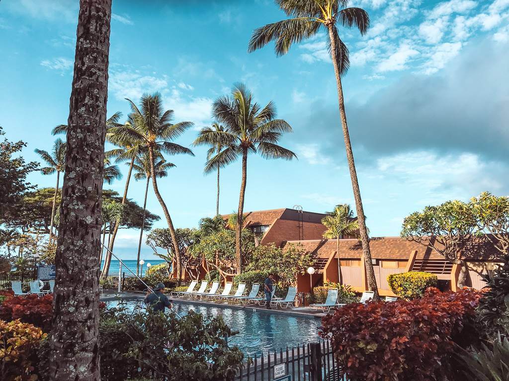 swimming pool in a condo complex along the ocean - maui on a budget