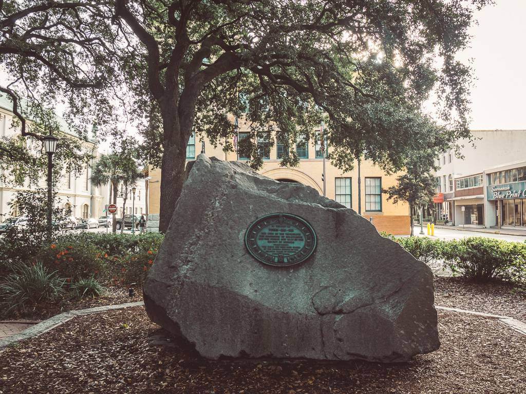 Boulder marking Tomochichi's grave site in Wright Square - historical sites in Savannah, GA