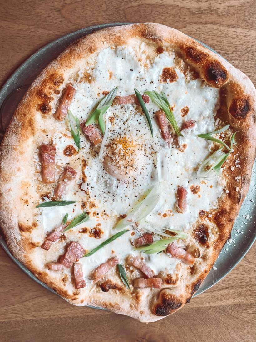 Delicious flatbread with over easy egg from The Obstinate Daughter - 3 days in Charleston
