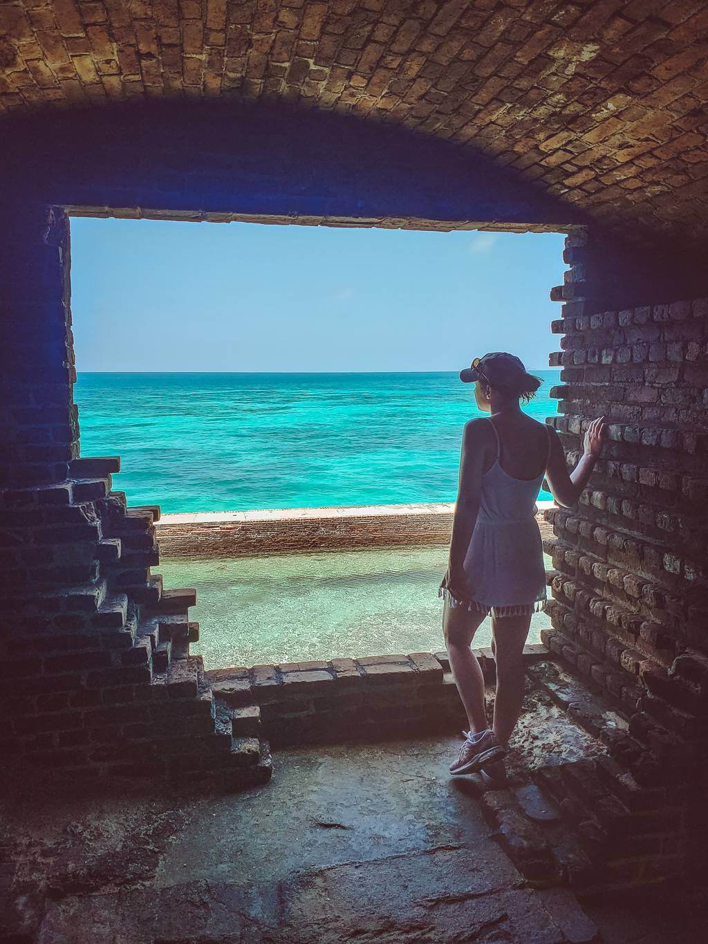 girl looking out into Gulf of Mexico from Fort Jefferson