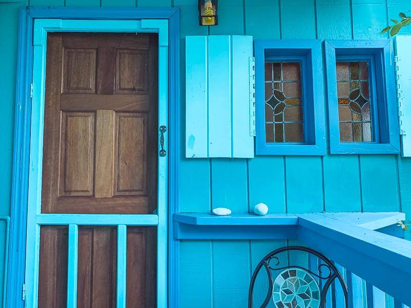 blue wooden exterior of apartment vacation rental