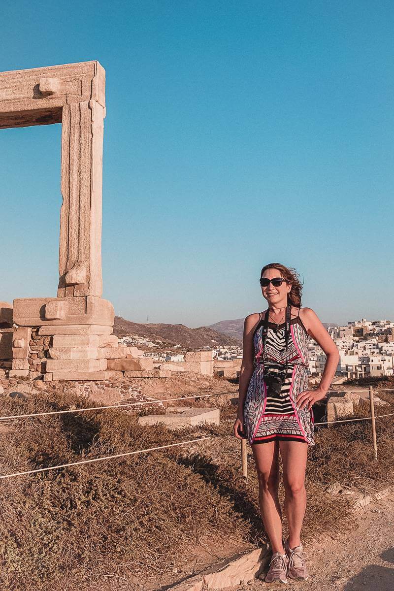 Girl in dress standing near Temple of Apollo on Naxos - 2022 New Year's Goals