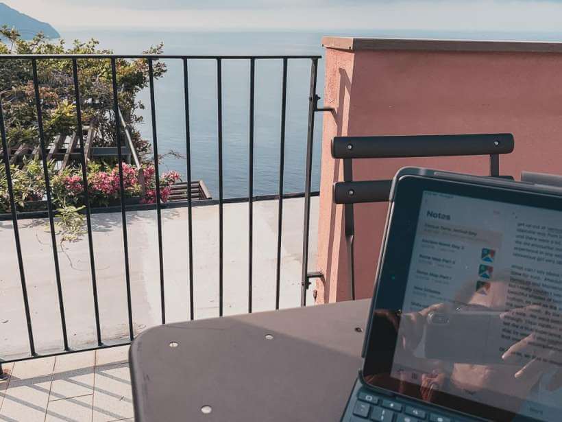 Ipad sitting on table on terrace in Corniglia Cinque Terre - 2022 goals
