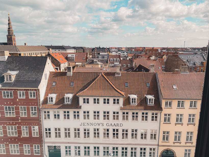 Overhead view of orange tile roofs in Copenhagen from hotel