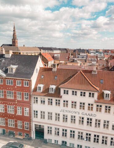 view over orange roofs from Copenhagen hotel - day trip in Copenhagen