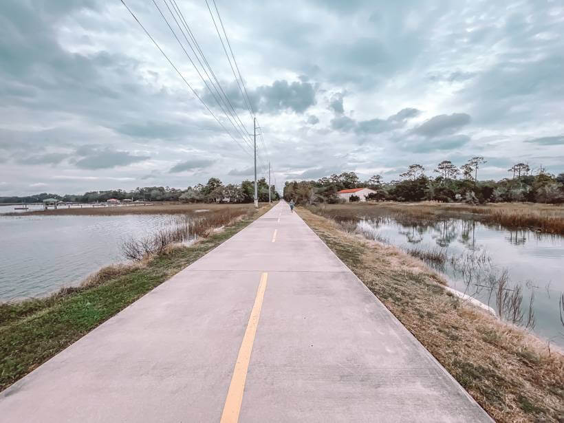 Spanish Moss Trail walking and biking  path surrounded by marshy river water near Beaufort