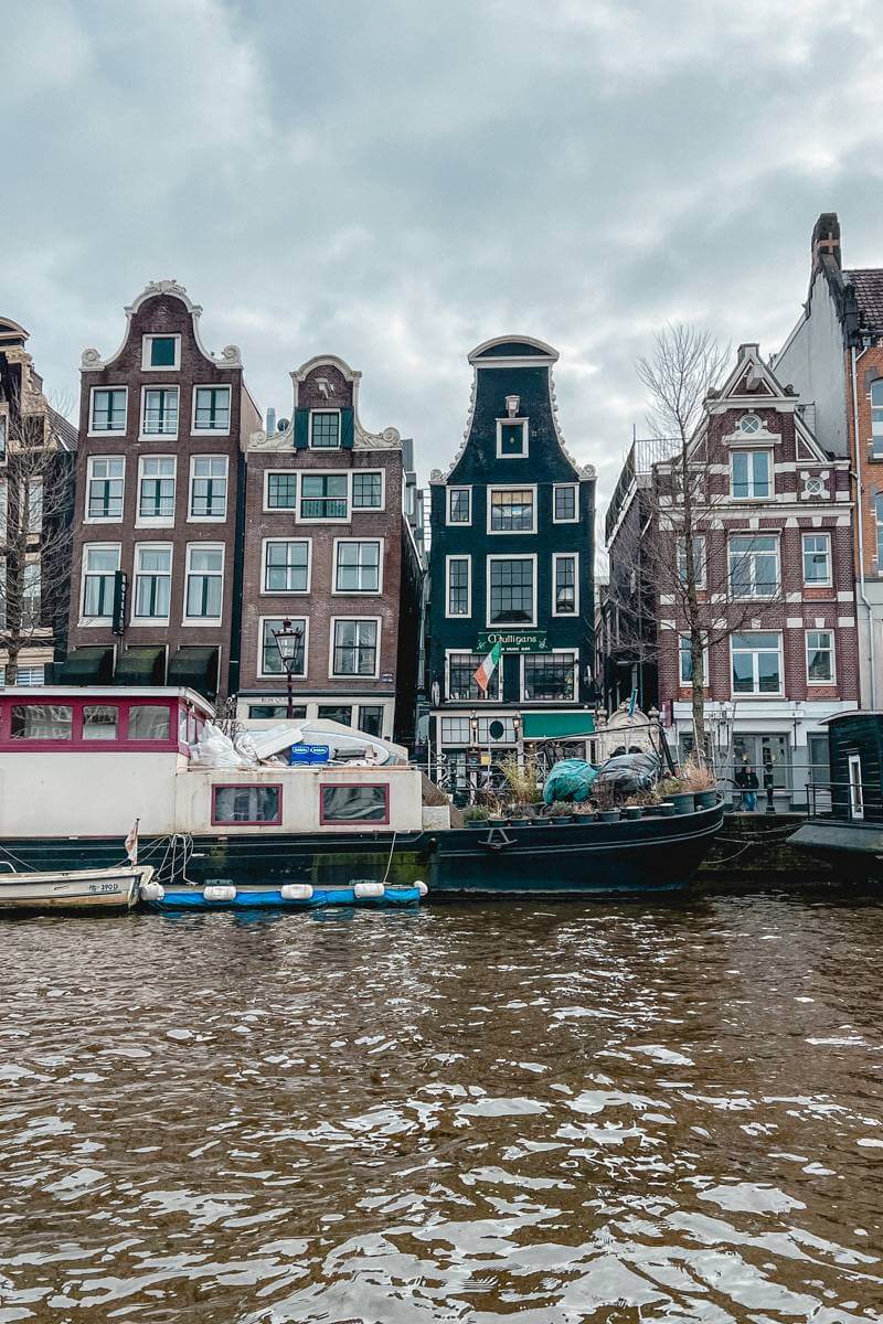 View of canal houses from canal cruise - Amsterdam trip cost