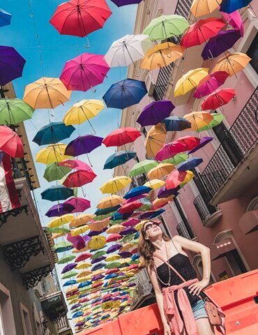 Girl standing in front of umbrella photo spot in Old San Juan, Puerto Rico