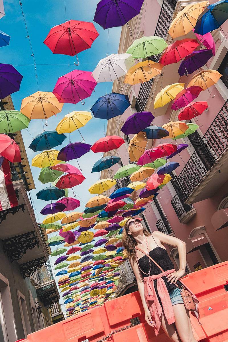 Girl standing in front of umbrella photo spot in Old San Juan, Puerto Rico