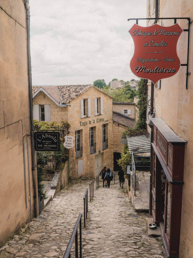 Charming cobblestone alleyway heading downhill in a village