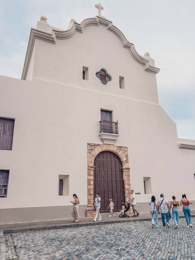 Plain white Spanish Gothic exterior of San Jose Church